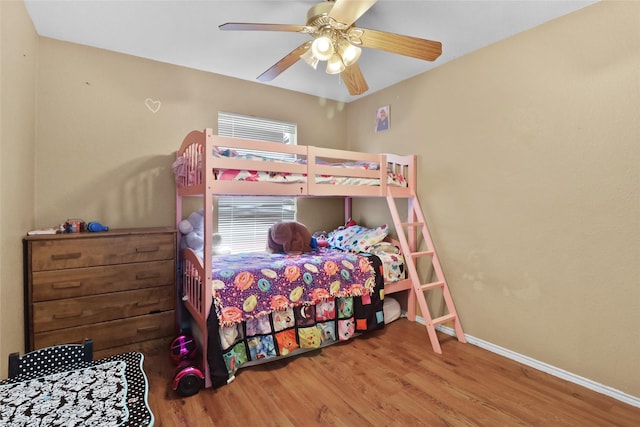 8436 Minturn Dr, Fort Worth, TX 76131 - bedroom featuring wood finished floors and a ceiling fan