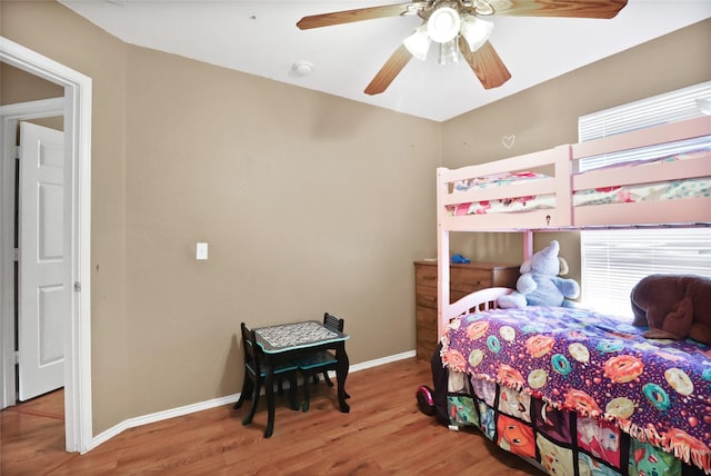 8436 Minturn Dr, Fort Worth, TX 76131 - bedroom with wood finished floors and ceiling fan