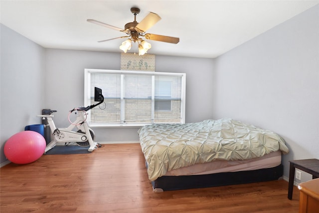 8436 Minturn Dr, Fort Worth, TX 76131 - bedroom featuring wood finished floors and a ceiling fan