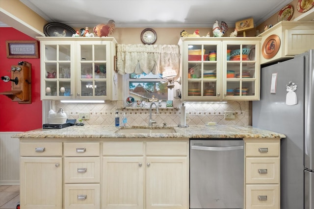 1121 W 3rd Ave, Corsicana, TX 75110 - kitchen featuring stainless steel appliances, tasteful backsplash, glass insert cabinets, and ornamental molding