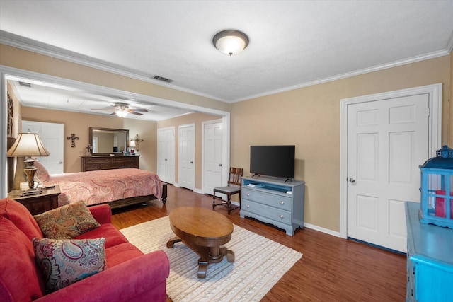 1121 W 3rd Ave, Corsicana, TX 75110 - bedroom featuring wood finished floors and crown molding