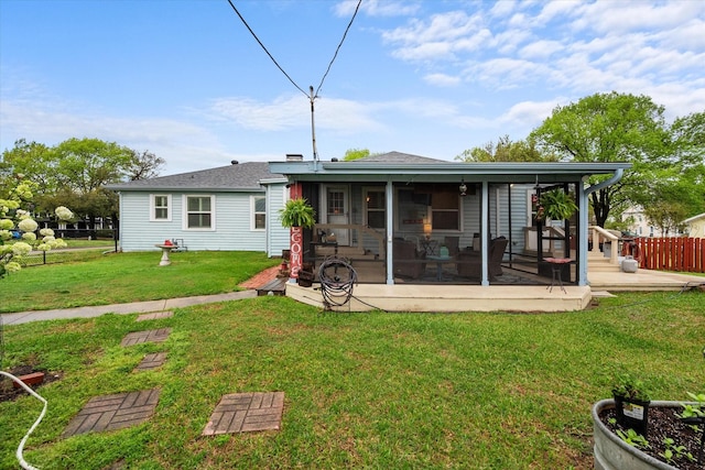 1121 W 3rd Ave, Corsicana, TX 75110 - rear view of property with a sunroom and roof with shingles