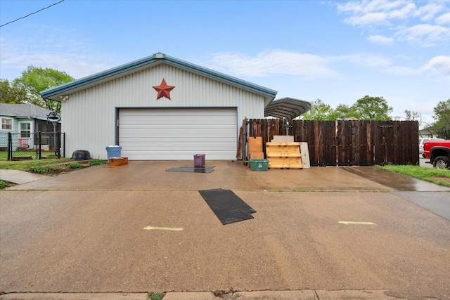 1121 W 3rd Ave, Corsicana, TX 75110 - detached garage with a detached carport and concrete driveway