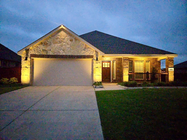 641 Woodridge Dr, Oak Point, TX 75068 - single story home with a garage, driveway, a front yard, brick siding, and a porch