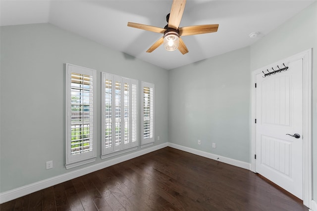 641 Woodridge Dr, Oak Point, TX 75068 - unfurnished bedroom with dark wood finished floors, ceiling fan, and lofted ceiling
