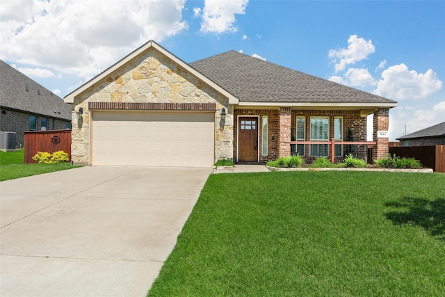 641 Woodridge Dr, Oak Point, TX 75068 - view of front of property featuring driveway, a garage, brick siding, and roof with shingles