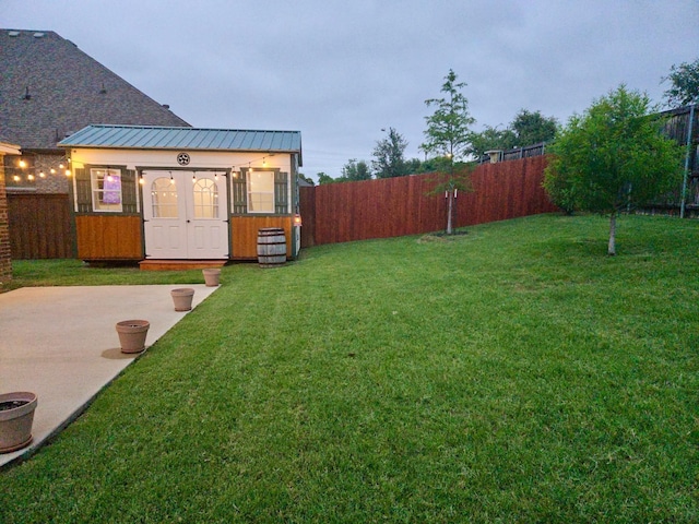 641 Woodridge Dr, Oak Point, TX 75068 - fenced backyard with an outbuilding