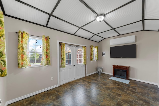 641 Woodridge Dr, Oak Point, TX 75068 - entryway featuring an AC wall unit, stone finish floors, a fireplace, and french doors
