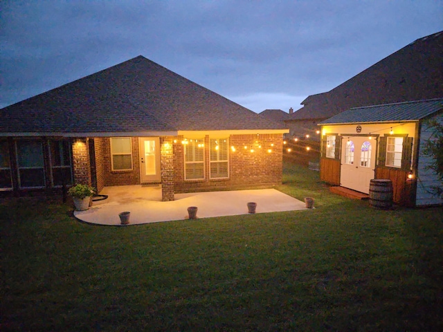 641 Woodridge Dr, Oak Point, TX 75068 - rear view of house featuring a patio area, a lawn, and an outbuilding