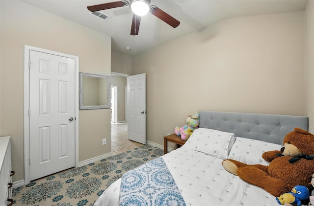2509 Creek Villas Dr, Bedford, TX 76022 - tiled bedroom with vaulted ceiling and a ceiling fan