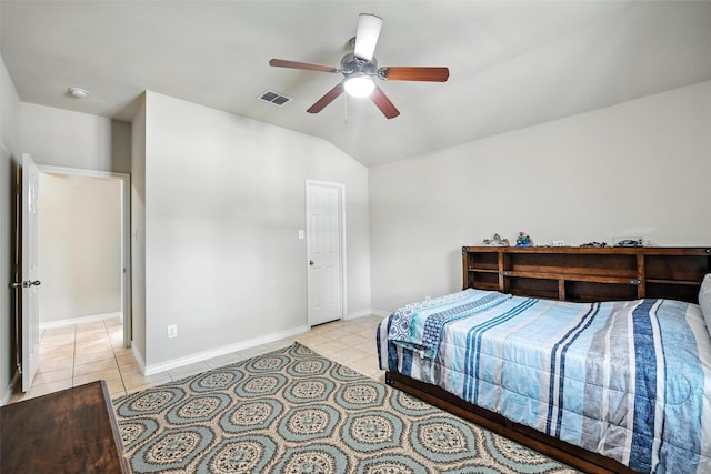 2509 Creek Villas Dr, Bedford, TX 76022 - bedroom with light tile patterned floors, lofted ceiling, and a ceiling fan