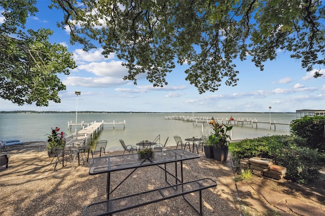 9999 Boat Club Rd Unit 107, Fort Worth, TX 76179 - view of patio / terrace featuring a boat dock and a water view