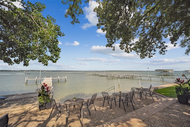 9999 Boat Club Rd Unit 107, Fort Worth, TX 76179 - view of patio / terrace featuring a boat dock and a water view