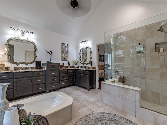 4597 Hallmark Dr, Plano, TX 75024 - full bathroom with vanity, ceiling fan, tiled shower, a bath, and tile patterned floors