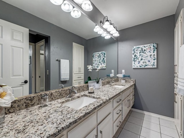 4597 Hallmark Dr, Plano, TX 75024 - bathroom with double vanity and tile patterned flooring