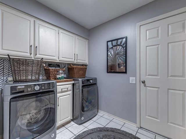 4597 Hallmark Dr, Plano, TX 75024 - laundry area with cabinet space, light tile patterned flooring, and separate washer and dryer