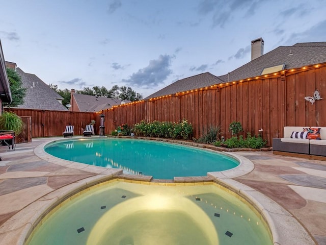 4597 Hallmark Dr, Plano, TX 75024 - view of swimming pool featuring a fenced backyard, a patio, and a pool with connected hot tub