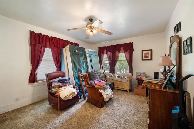 110 Woodland Ave, Corsicana, TX 75110 - living area featuring ceiling fan and carpet floors