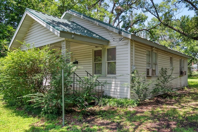 110 Woodland Ave, Corsicana, TX 75110 - view of side of home with a metal roof