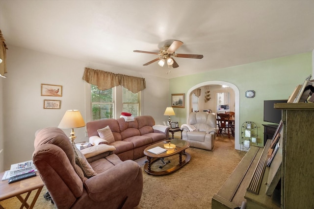 110 Woodland Ave, Corsicana, TX 75110 - carpeted living area with arched walkways and ceiling fan