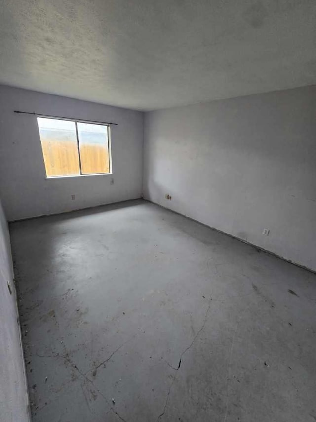 3706 Greenhill Ln, Grand Prairie, TX 75052 - unfurnished room with unfinished concrete flooring