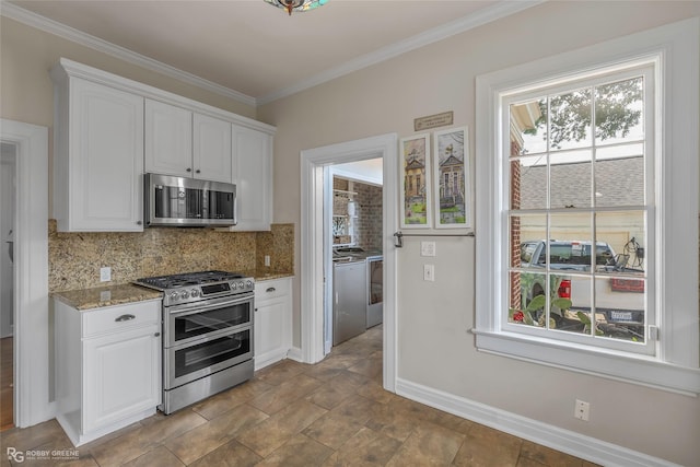 539 Atkins Ave, Shreveport, LA 71104 - kitchen with stainless steel appliances, tasteful backsplash, white cabinetry, crown molding, and light stone countertops