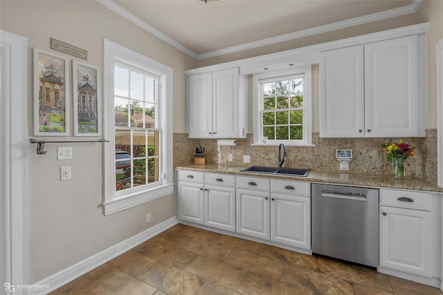 539 Atkins Ave, Shreveport, LA 71104 - kitchen with stainless steel dishwasher, decorative backsplash, white cabinets, crown molding, and light stone counters