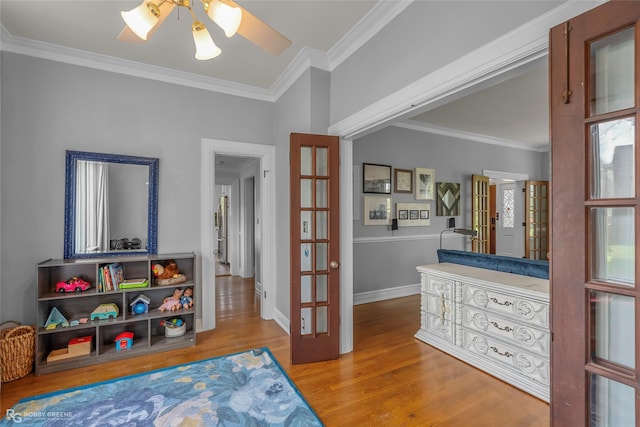 539 Atkins Ave, Shreveport, LA 71104 - bedroom with french doors, wood finished floors, ornamental molding, and ceiling fan