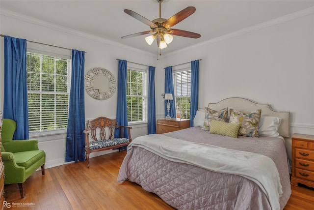 539 Atkins Ave, Shreveport, LA 71104 - bedroom featuring hardwood / wood-style flooring, ornamental molding, and ceiling fan