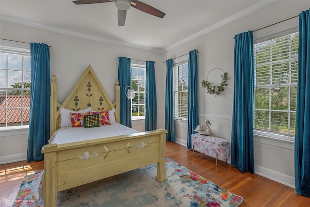 539 Atkins Ave, Shreveport, LA 71104 - bedroom featuring wood finished floors, crown molding, and ceiling fan