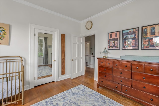539 Atkins Ave, Shreveport, LA 71104 - bedroom with crown molding and wood finished floors