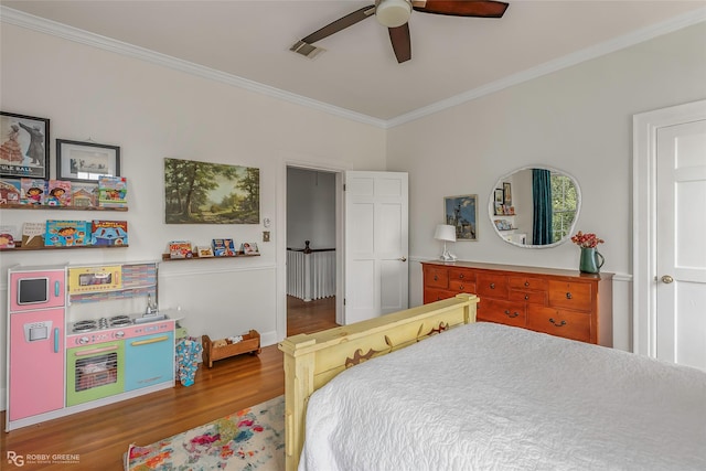 539 Atkins Ave, Shreveport, LA 71104 - bedroom featuring ornamental molding, wood finished floors, and ceiling fan