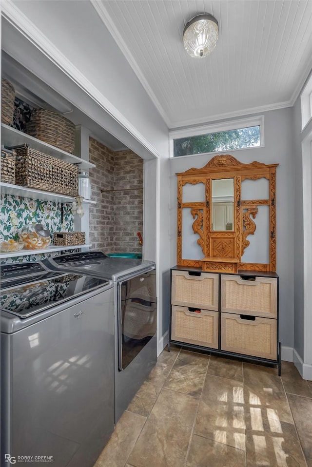 539 Atkins Ave, Shreveport, LA 71104 - kitchen with ornamental molding, stone finish floors, and washing machine and dryer