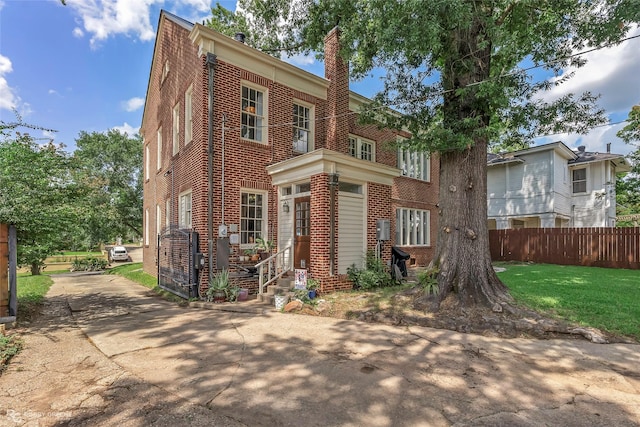 539 Atkins Ave, Shreveport, LA 71104 - view of front of home with brick siding and a chimney