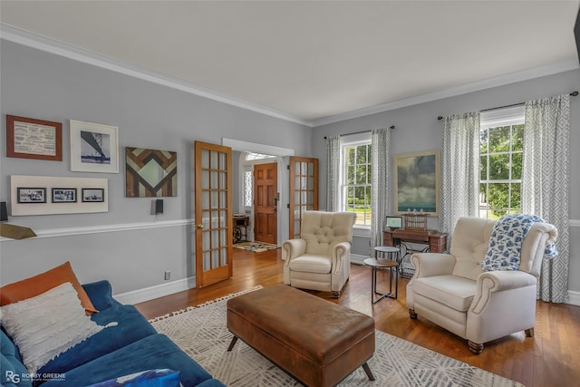 539 Atkins Ave, Shreveport, LA 71104 - living area featuring french doors, crown molding, and wood finished floors