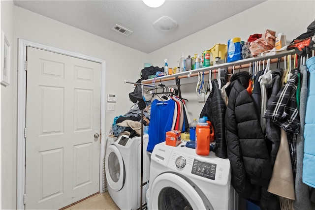 3440 Baby Doe Ct, Fort Worth, TX 76137 - washroom with washing machine and dryer, a textured ceiling, and tile patterned floors