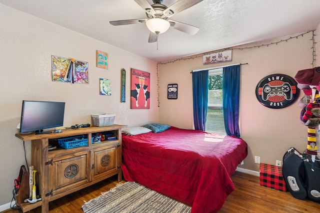 1321 S Lamar St, Weatherford, TX 76086 - bedroom featuring wood finished floors and a ceiling fan