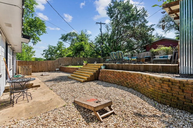 1321 S Lamar St, Weatherford, TX 76086 - fenced backyard with a patio