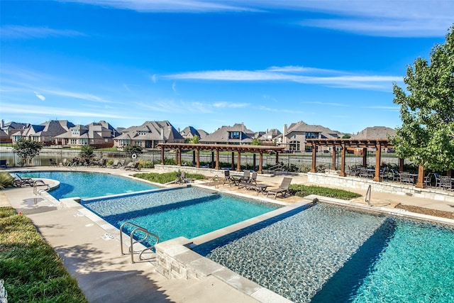 7709 Waterside, The Colony, TX 75056 - community pool with a pergola, a residential view, and a patio area