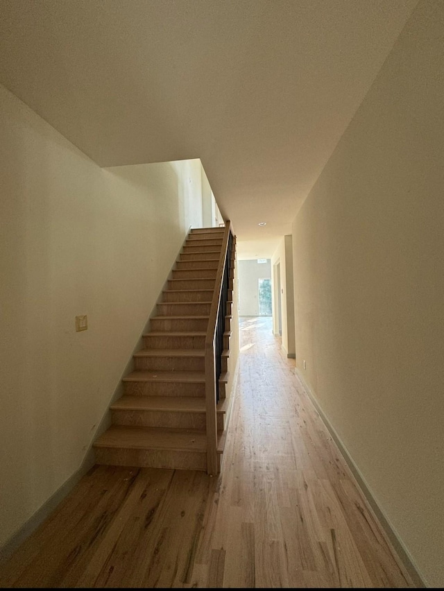 906 S Ewing Ave, Dallas, TX 75203 - stairs with wood finished floors and baseboards