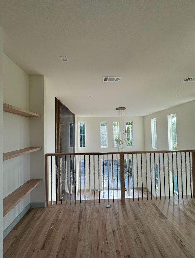 906 S Ewing Ave, Dallas, TX 75203 - hallway with wood finished floors and baseboards