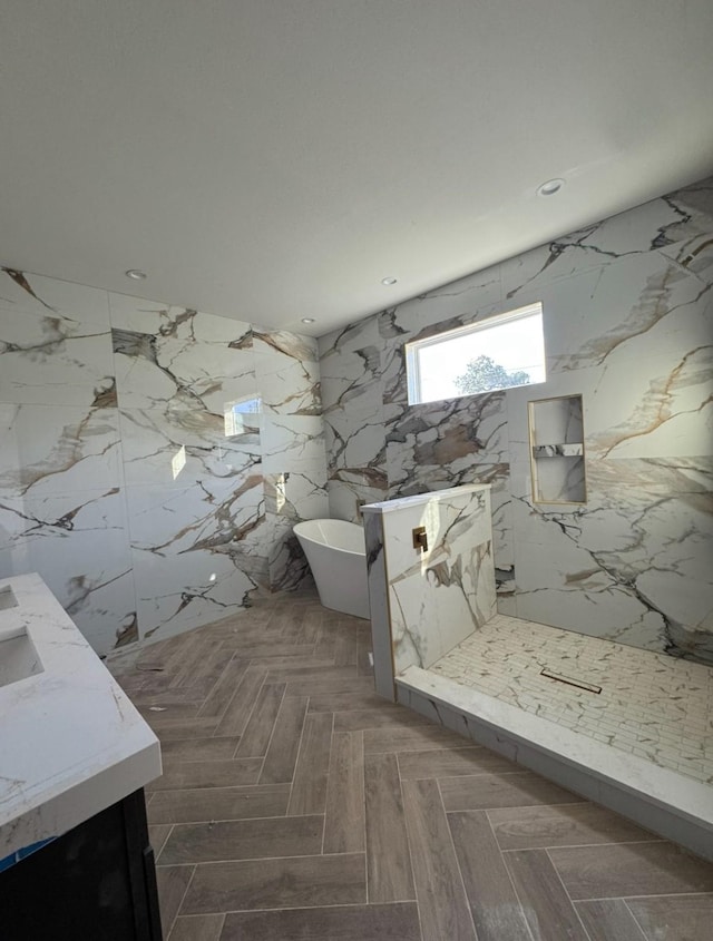 906 S Ewing Ave, Dallas, TX 75203 - bathroom with double vanity, a freestanding bath, recessed lighting, and a marble finish shower