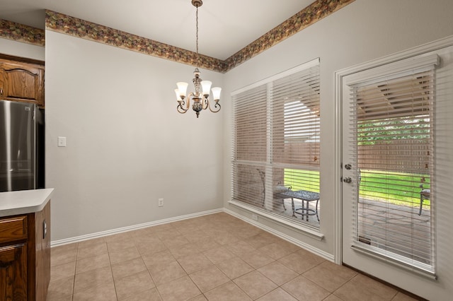 103 Deer Ct, Mansfield, TX 76063 - unfurnished dining area with a chandelier and baseboards