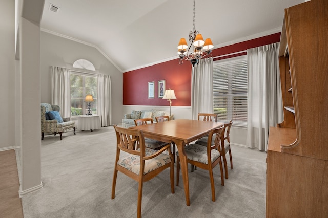 103 Deer Ct, Mansfield, TX 76063 - dining room featuring a chandelier, ornamental molding, vaulted ceiling, and light colored carpet