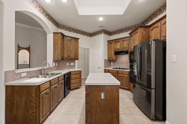 103 Deer Ct, Mansfield, TX 76063 - kitchen featuring black appliances, a center island, decorative backsplash, recessed lighting, and light countertops