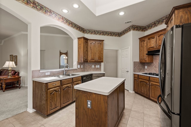 103 Deer Ct, Mansfield, TX 76063 - kitchen featuring freestanding refrigerator, a center island, light countertops, black dishwasher, and tasteful backsplash