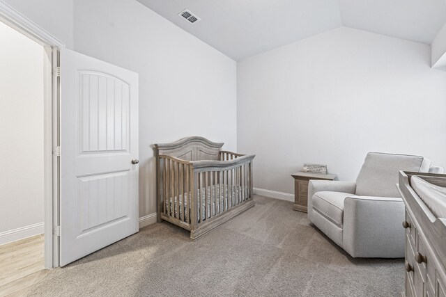 14840 Nightmist Rd, Aledo, TX 76008 - carpeted bedroom with vaulted ceiling and a crib