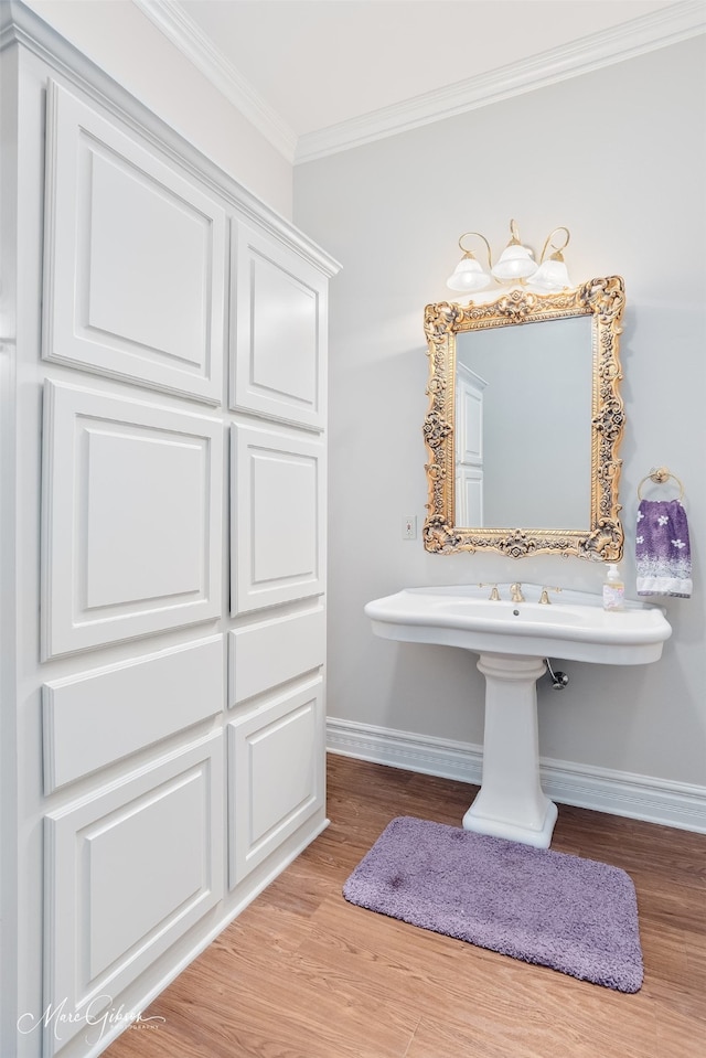 3669 Fountainbleau Rd, Keithville, LA 71047 - bathroom with ornamental molding and wood finished floors