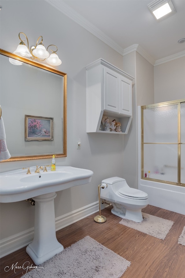3669 Fountainbleau Rd, Keithville, LA 71047 - full bath featuring crown molding, wood finished floors, and enclosed tub / shower combo