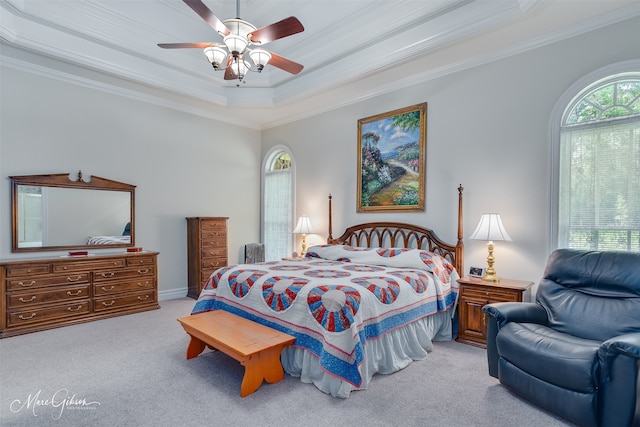 3669 Fountainbleau Rd, Keithville, LA 71047 - bedroom featuring a tray ceiling, light carpet, crown molding, and a ceiling fan